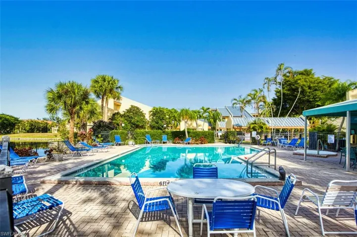 Community pool featuring a patio
