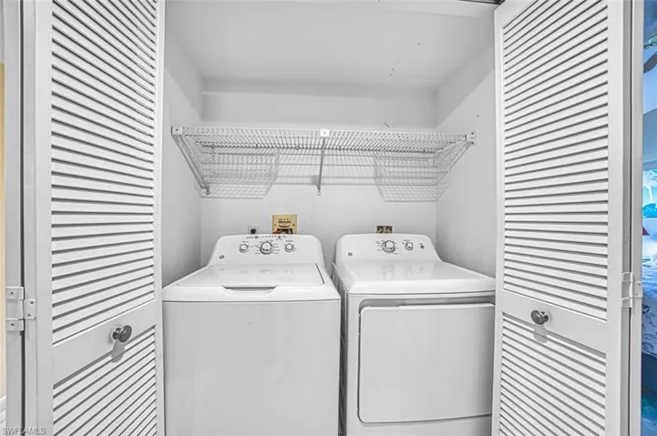 Laundry area featuring washing machine and dryer