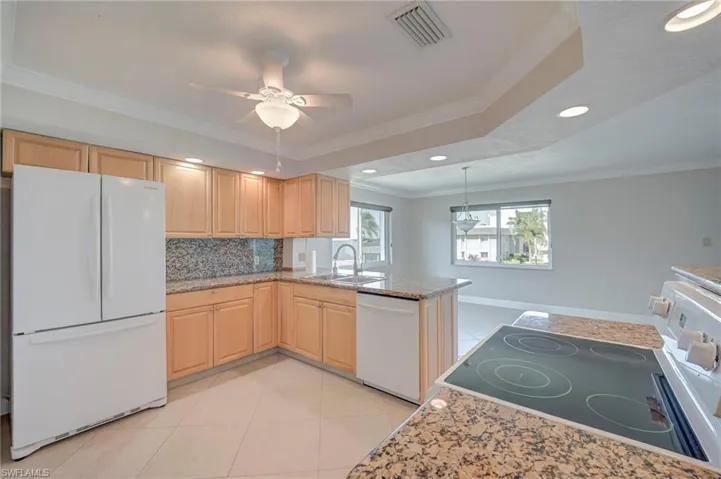 Tray Ceiling with Crown Molding!  Tile Flooring is continued throughout with different flooring to bedrooms!
