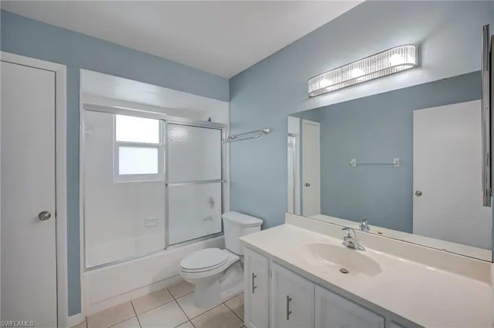 Guest Bath is nice and wide!  Updated lighting!