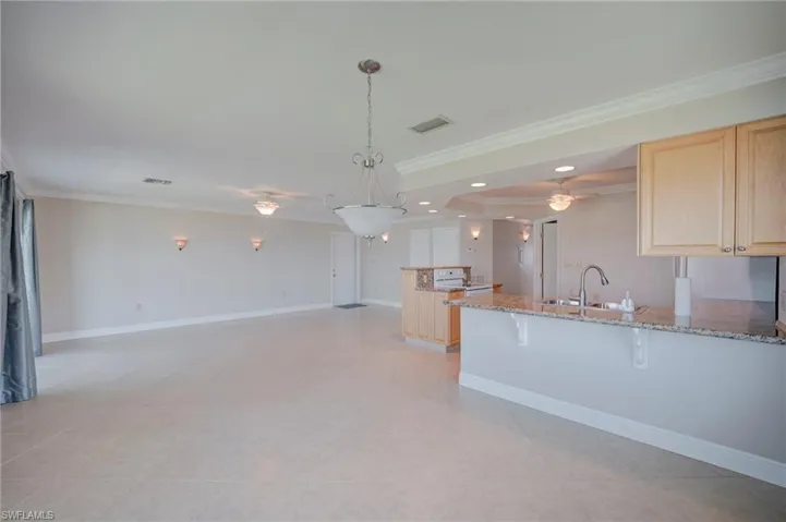 Dining Area with Breakfast Bar ~ Bar Stools would look great there!
