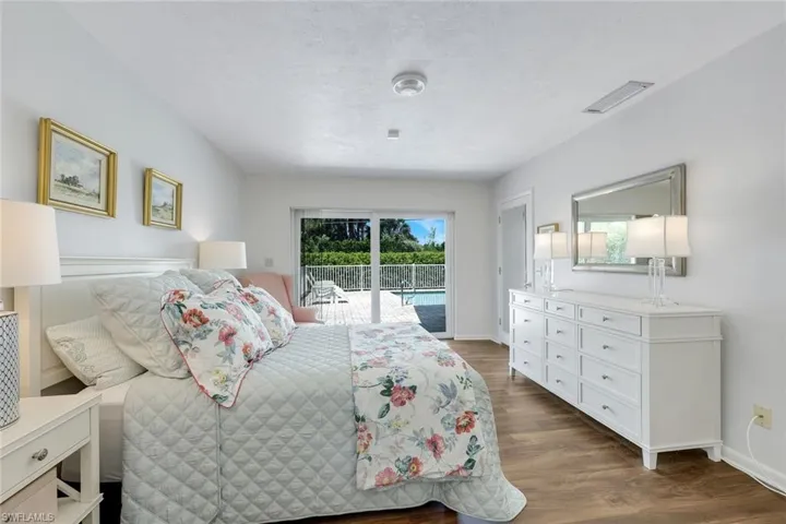 Access the lanai/pool from your primary bedroom.