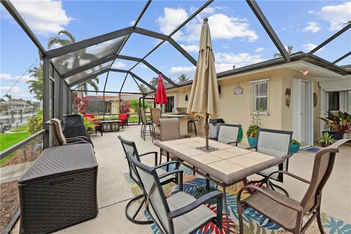 Gorgeous outside living space with outside kitchen