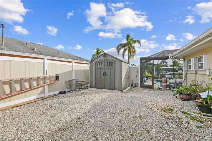 Side yard with storage shed and full house generator