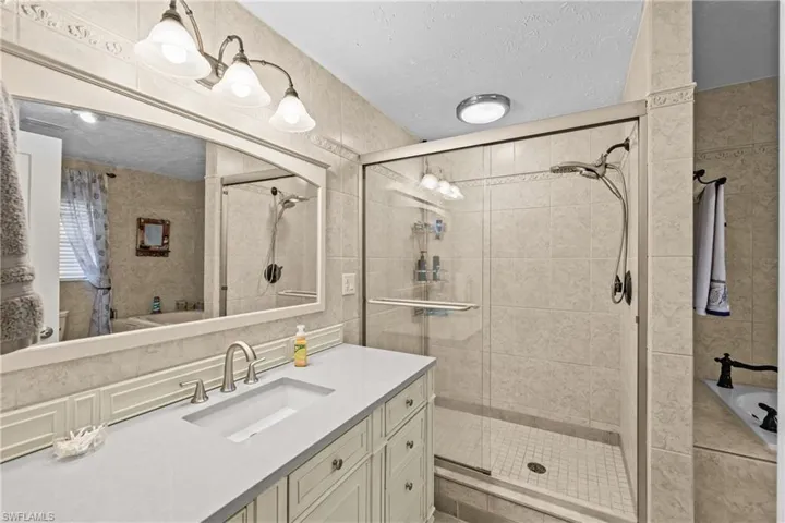 Master Bath (one sink) separate tub and shower