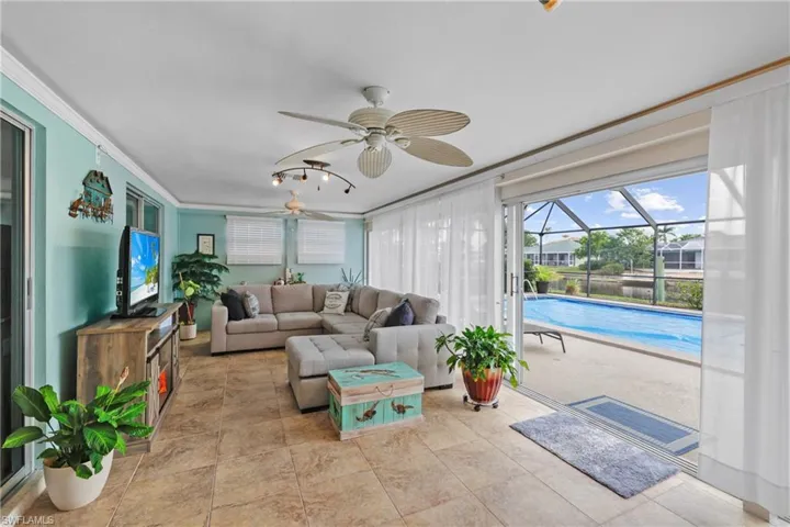 Open up the sun room to include the outside space with plenty of room for a large gathering