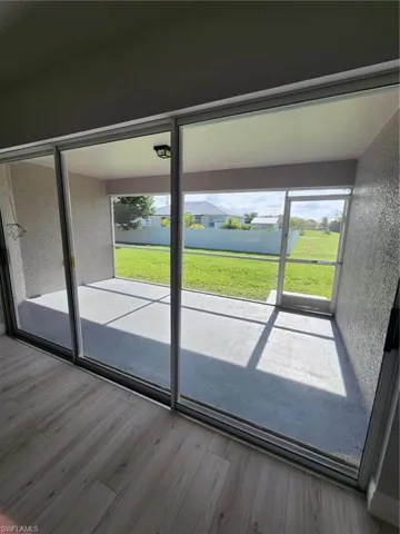 Doorway featuring hardwood / wood-style flooring