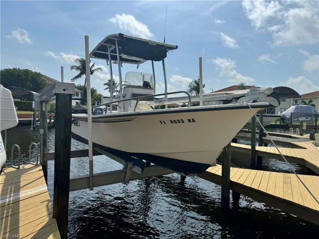 Dock area featuring a water view