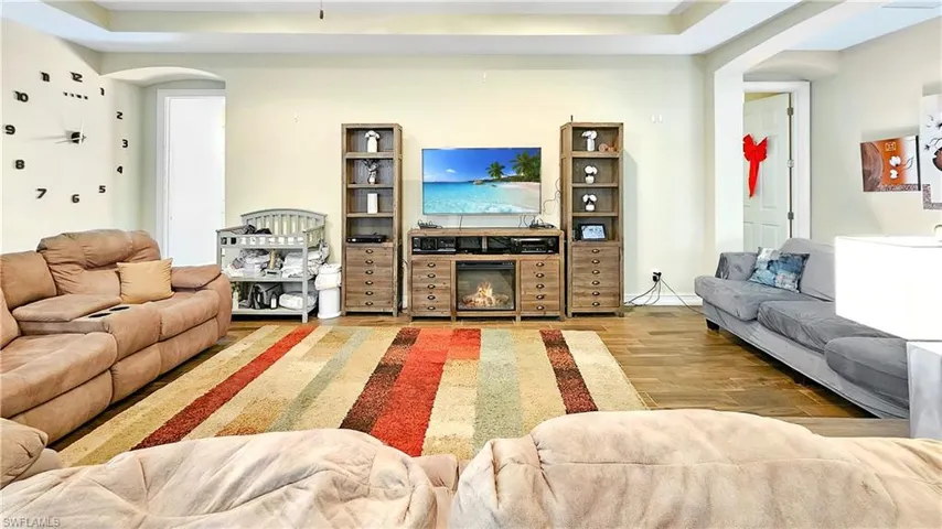 Living room featuring a fireplace and hardwood / wood-style flooring