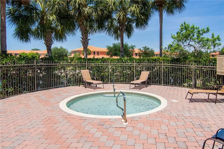 View of swimming pool with patio surround