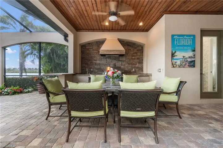 View of patio / terrace featuring a ceiling fan and outdoor dining space