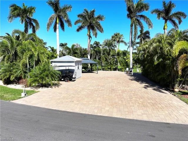 View of front of home featuring a carport