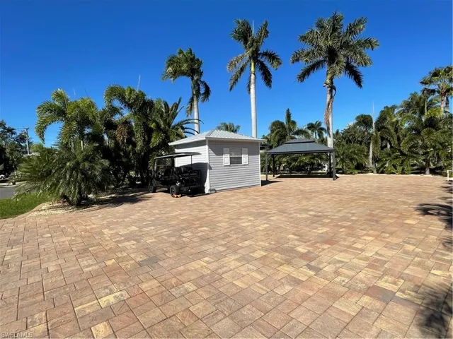 View of patio with a gazebo and a carport