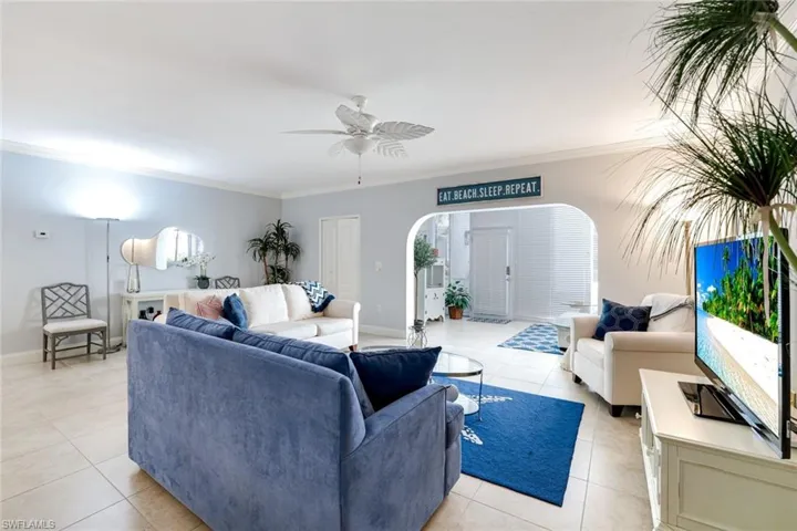 Living room open to entrance & lanai