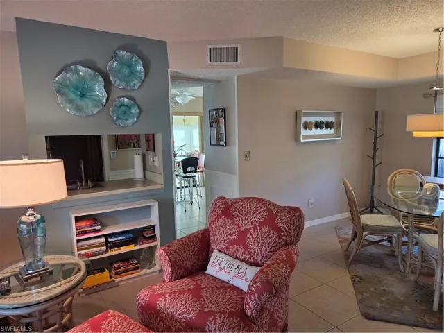 Living room and Dining room, looking through to the Kitchen