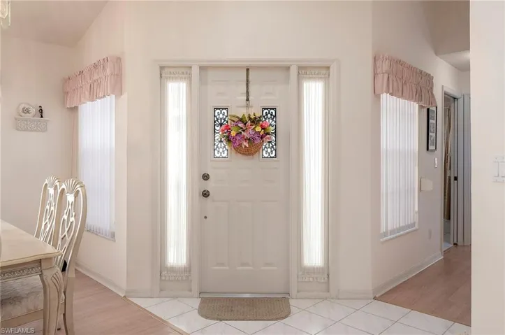 Foyer featuring light hardwood / wood-style floors and plenty of light