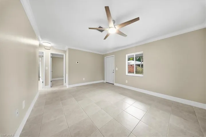 Full bathroom featuring vanity and light tile patterned flooring