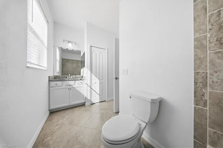 Full bathroom with vanity and bathtub / shower combination
