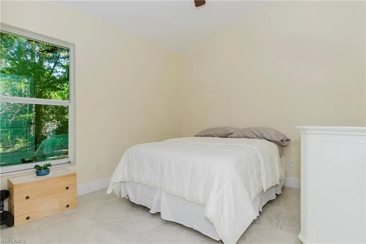Bedroom #2 with a ceiling fan and large closet