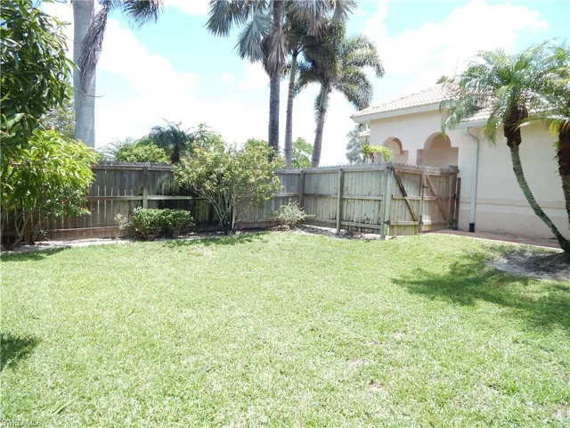 View of fenced backyard