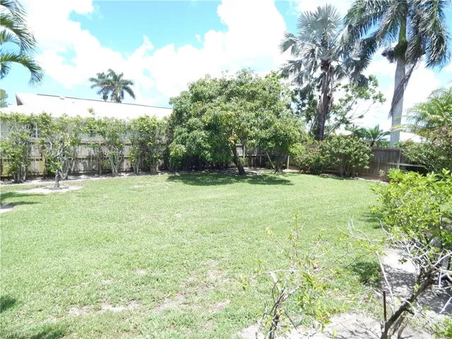 View of fenced backyard