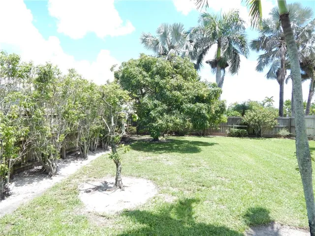 View of fenced backyard