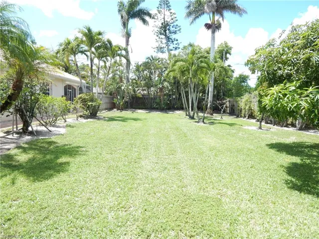View of fenced backyard