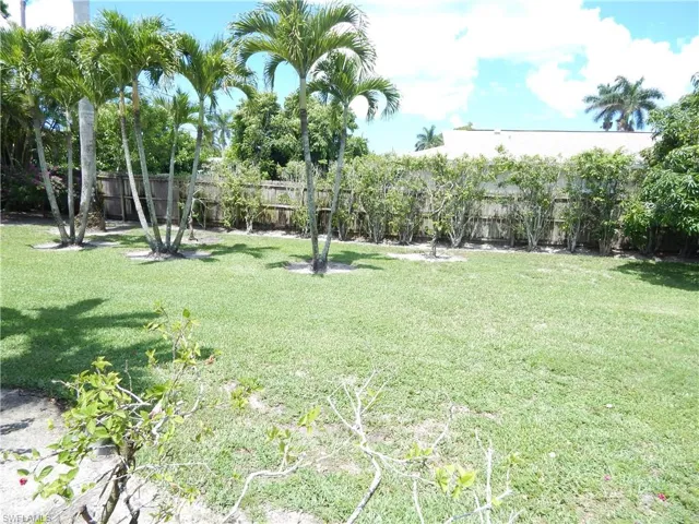 View of fenced backyard
