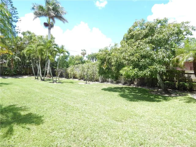 View of fenced backyard