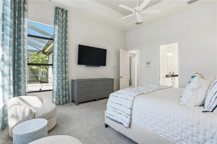 Bedroom featuring carpet and a ceiling fan