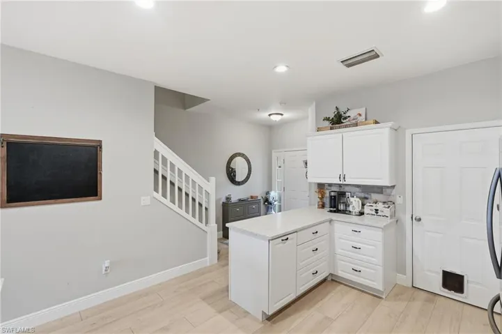 Build in additional kitchen cabinets
