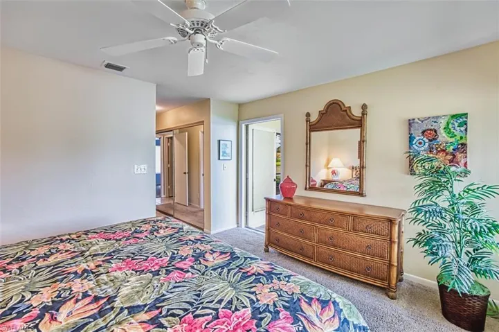 Bedroom featuring carpet floors and a ceiling fan