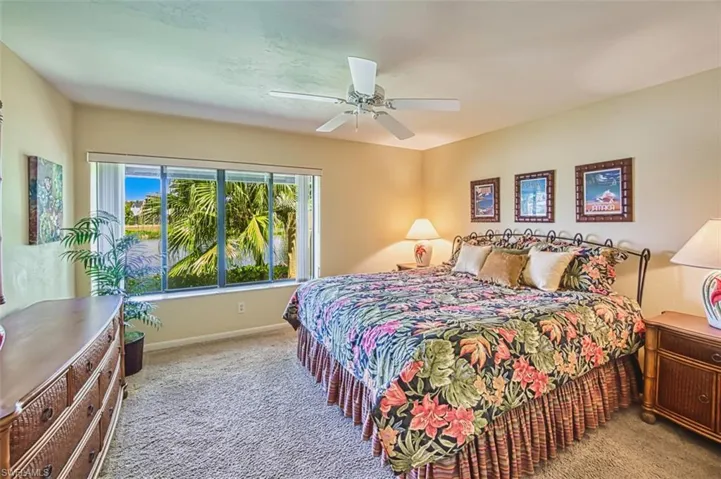 Bedroom featuring carpet flooring and ceiling fan