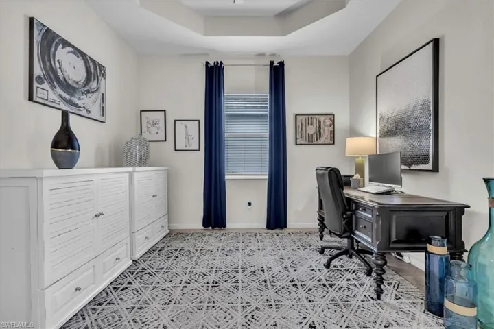 Tray ceiling accentuates the room's height
