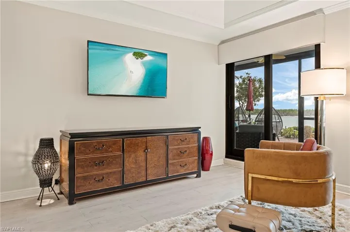 Primary bedroom with direct lanai access.