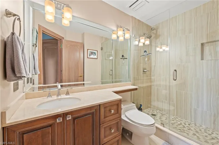 Guest bathroom with walk-in shower.