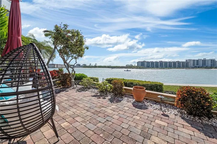 Private paved patio with water views.