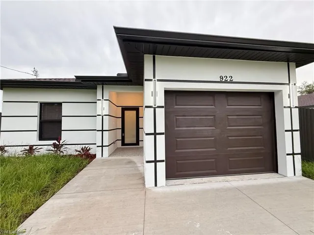 Entrance to property featuring driveway