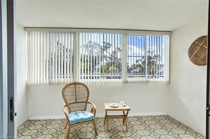 Sitting room with a new hurricane window