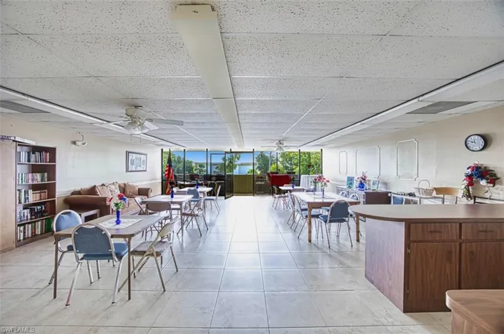 View of patio / terrace with ceiling fan, outdoor dining space, and outdoor lounge area