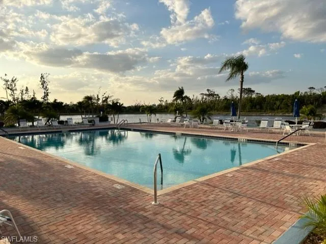 Community pool with a patio area