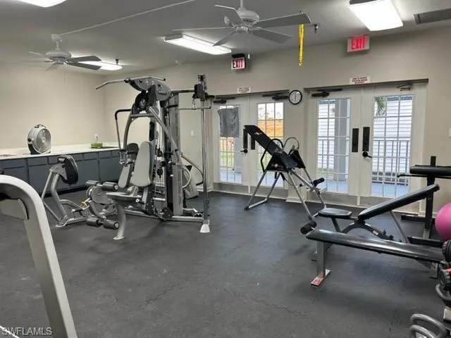 Exercise room with a ceiling fan
