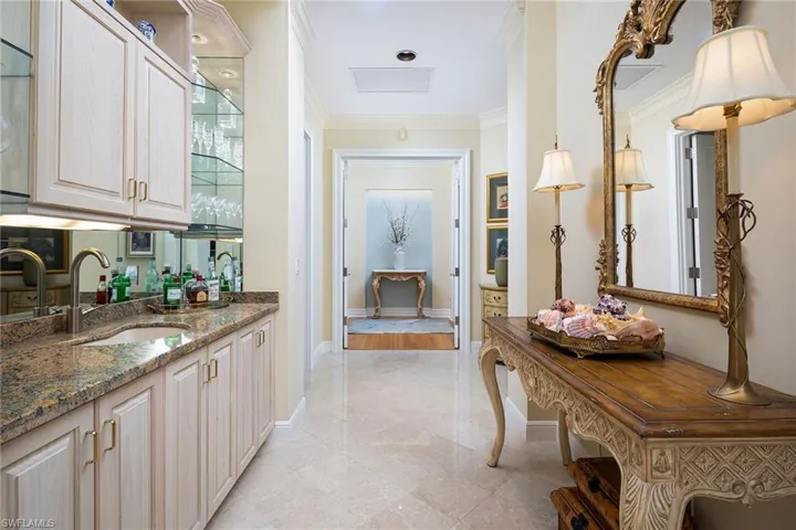 Hallway with crown molding