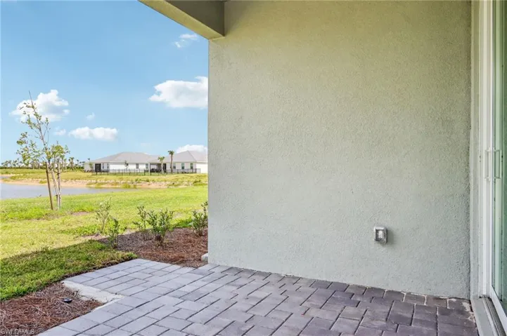 View of patio featuring a water view