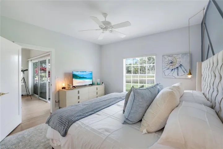 Bedroom featuring ceiling fan and wood finished floors