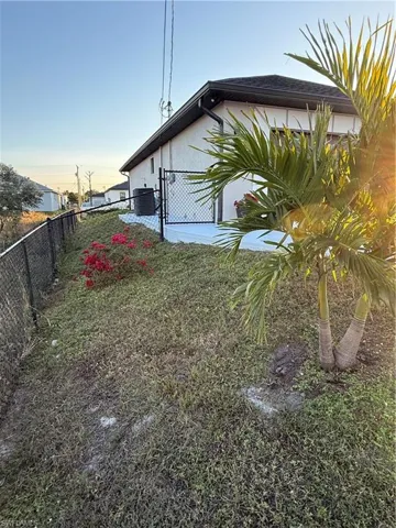 View of yard with central AC unit