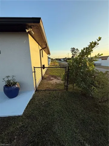 View of yard at dusk
