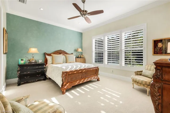 Bedroom with ornamental molding, a ceiling fan, carpet flooring, and recessed lighting