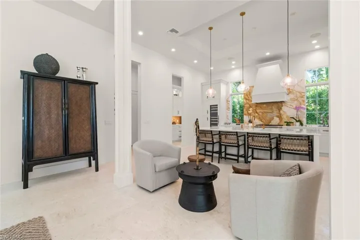 Intimate conversation area near kitchen