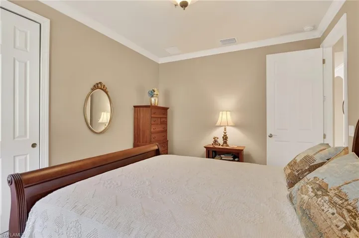 Bedroom with crown molding